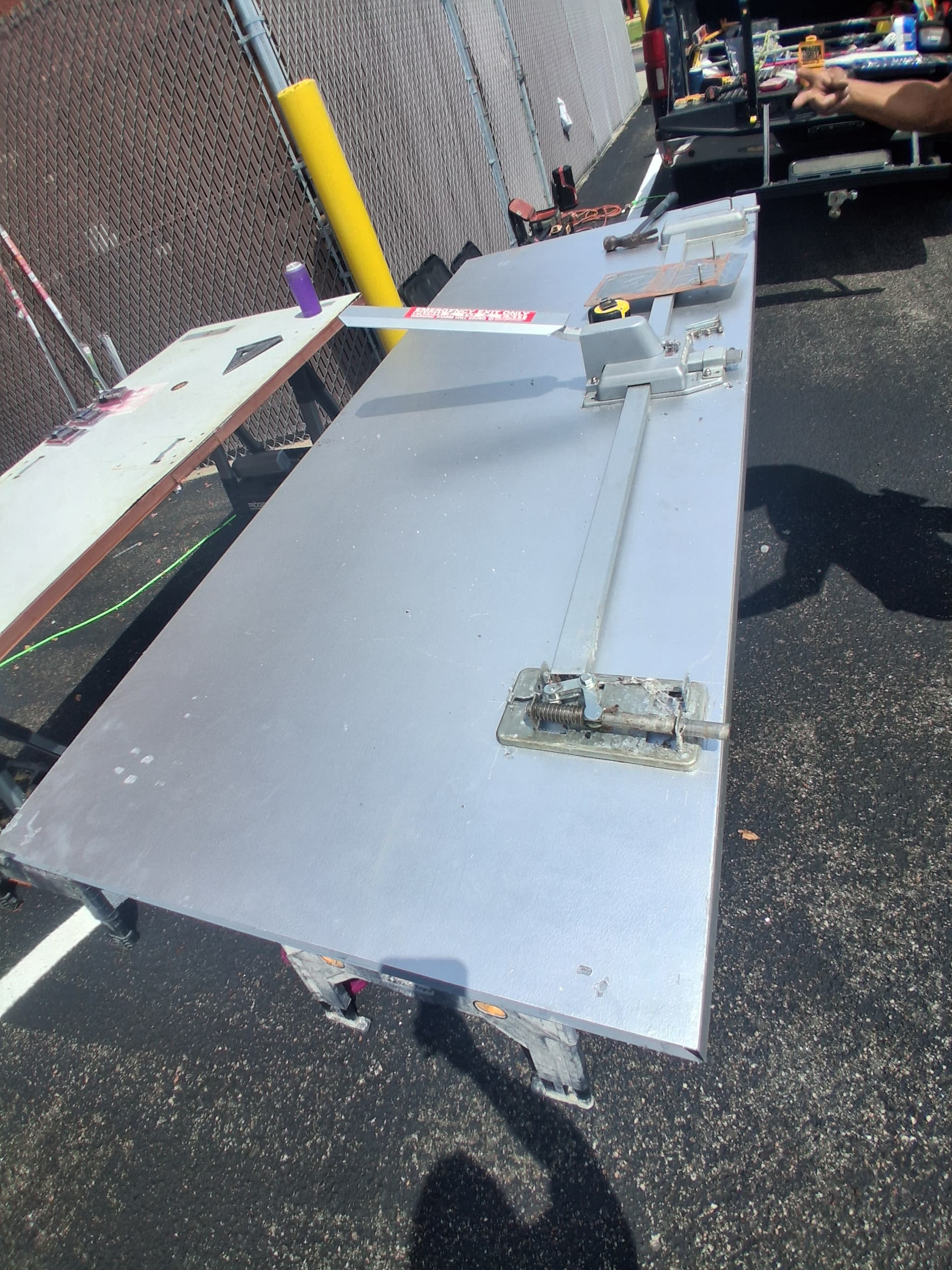 Replaced commercial exterior door with exit hardware